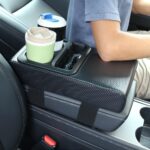 Supin Car Armrest Cushion - Multifunctional Faux Leather Armrest Cushion with Cup Holder, Phone Storage, and Ergonomic Design for All Seasons (Carbon Style)